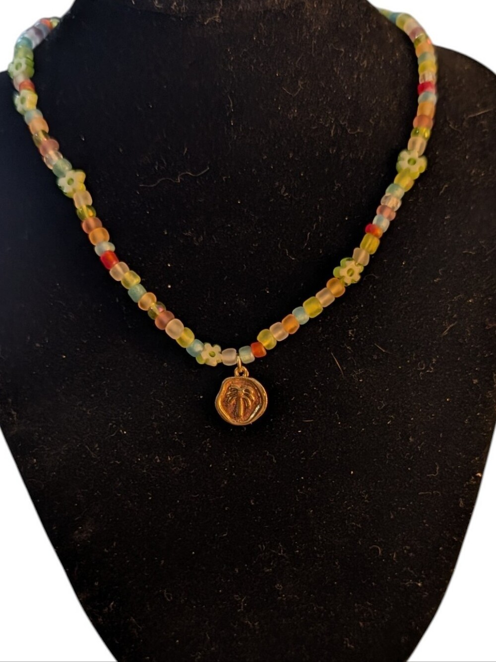 Multicolor Floral Bead Necklace with Gold Palm Pendant